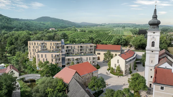 Wohnhausanlage am Dorfplatz mit Kirche und Ausblick ins Grüne