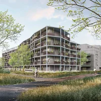 Wohnhausanlage mit Balkonen, Radfahrern und Blick ins Grüne