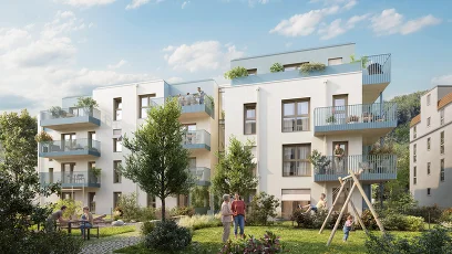 Wohnhausanlage mit großzügigen Balkonen, begrüntem Innenhof und Spielbereich